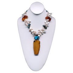 A.Jeschel Pearl necklace with spectacular Amber pendant.
