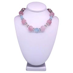A.Jeschel Stunning Carved Rose Quartz and Blue Topaz necklace.