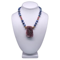 A.Jeschel  Rich Blue Kyanite with a Geode Tourmaline pendant