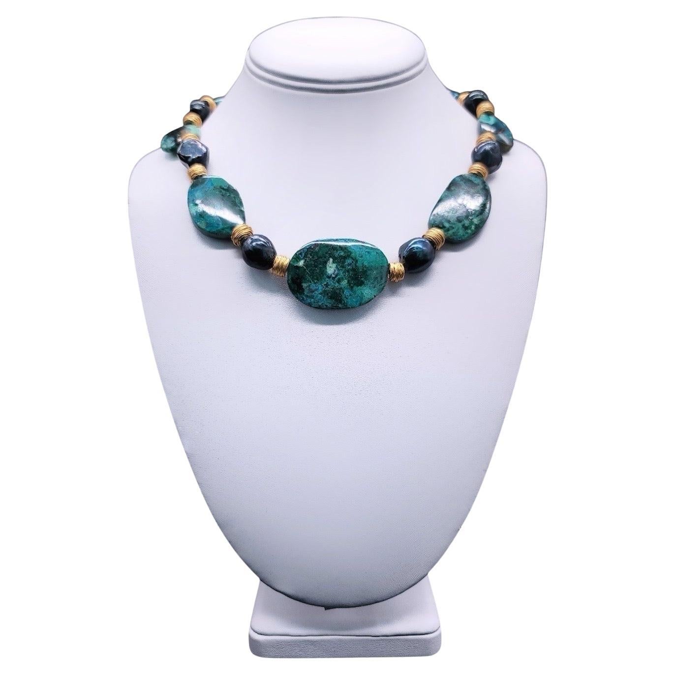 A.Jeschel Gem Silica necklace separated by green peacock Baroque Pearls.