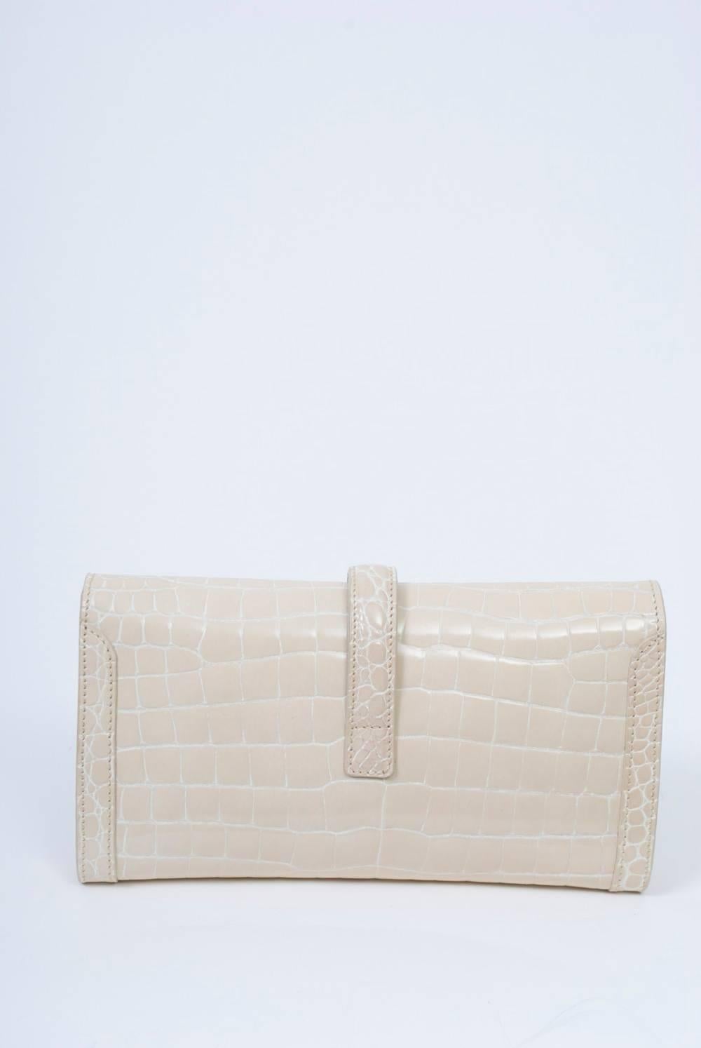 Ivory faux alligator clutch with 
