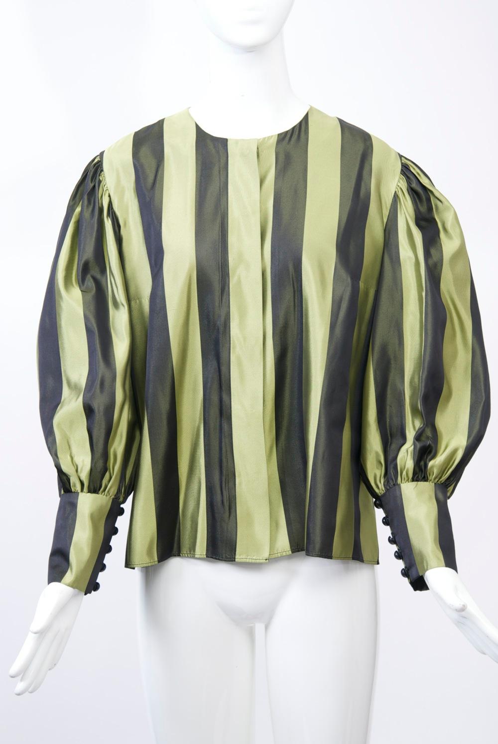 Blouse and shawl ensemble in pale olive and black striped silk, the collarless blouse featuring hidden buttons and juliet sleeves with deep buttoned wrists. The shawl, matching stripes on one sde, black velvet on the other, is long and deep. The