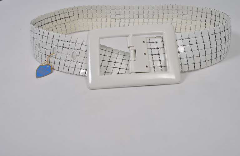 Whiting & Davis white mesh belt with solid white metal rectangular buckle. Adjustable waist from 27-29 1/2