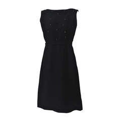 Vestido de crepé negro de los años 60 con corpiño de pedrería