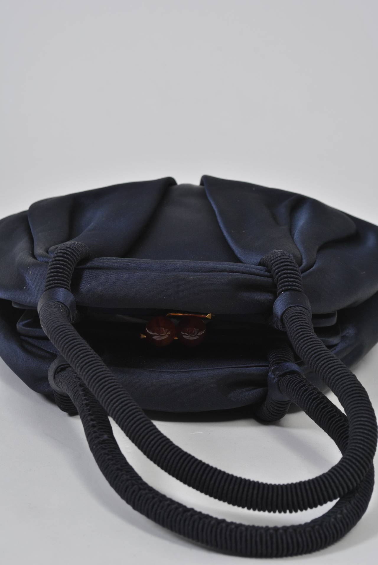 navy satin handbag