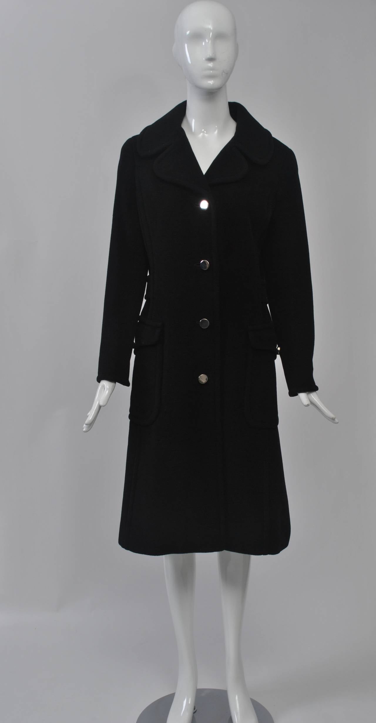 Attributed to Bill Gibb, who was at the forefront of the British fashion movement during the 1960s and '70s and who freelanced for the fashion firm Baccarat 1969-71, this coat has a contemporary look and great detailing. Slightly A-line in shape,