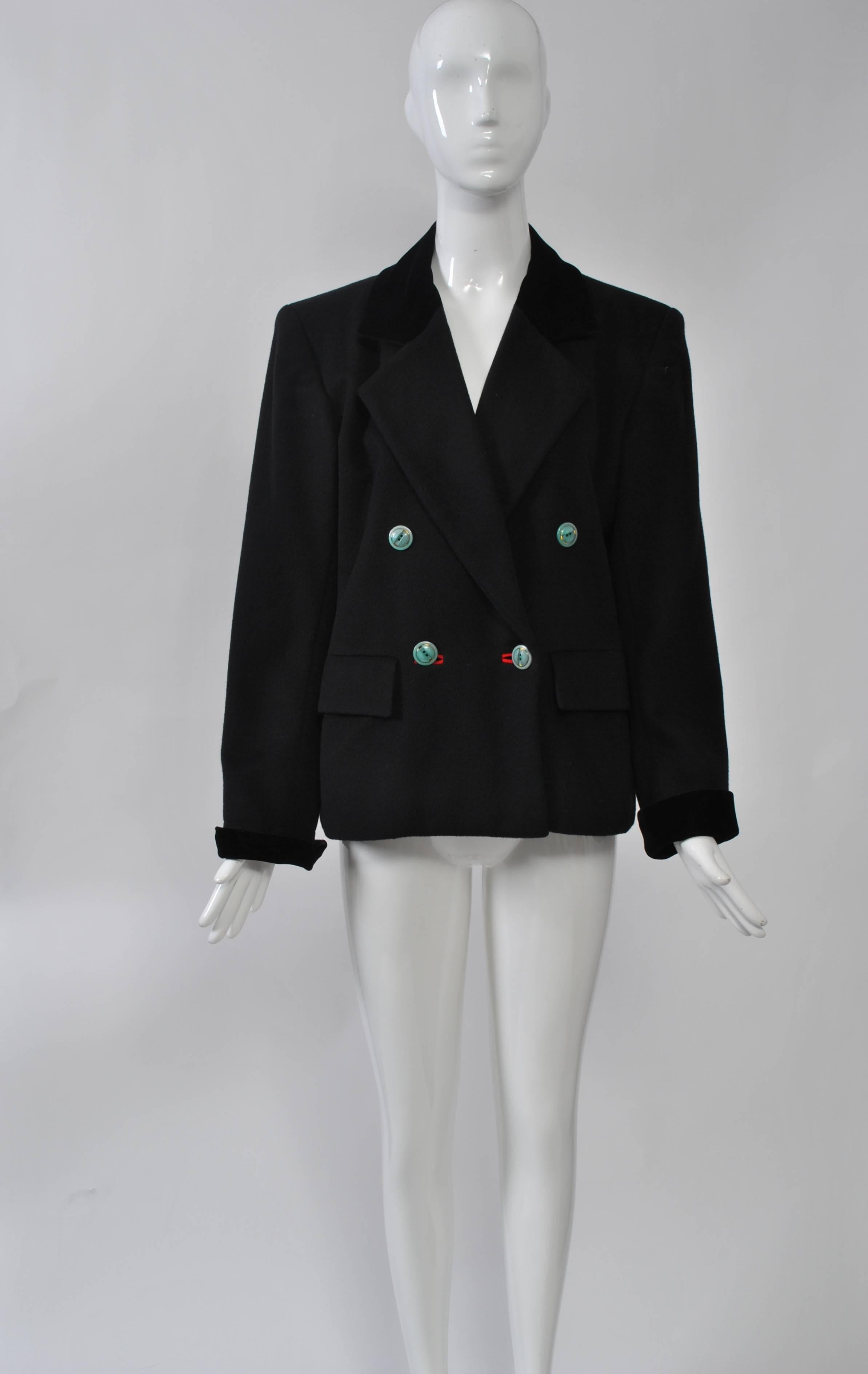 Saint Laurent Rive Gauche double-breasted jacket in a soft wool with a cashmere feel (no content label) offers an unexpected twist on a classic - aqua buttons in red-bound buttonholes. Wide lapels with black velvet half collar and turned-back cuffs.