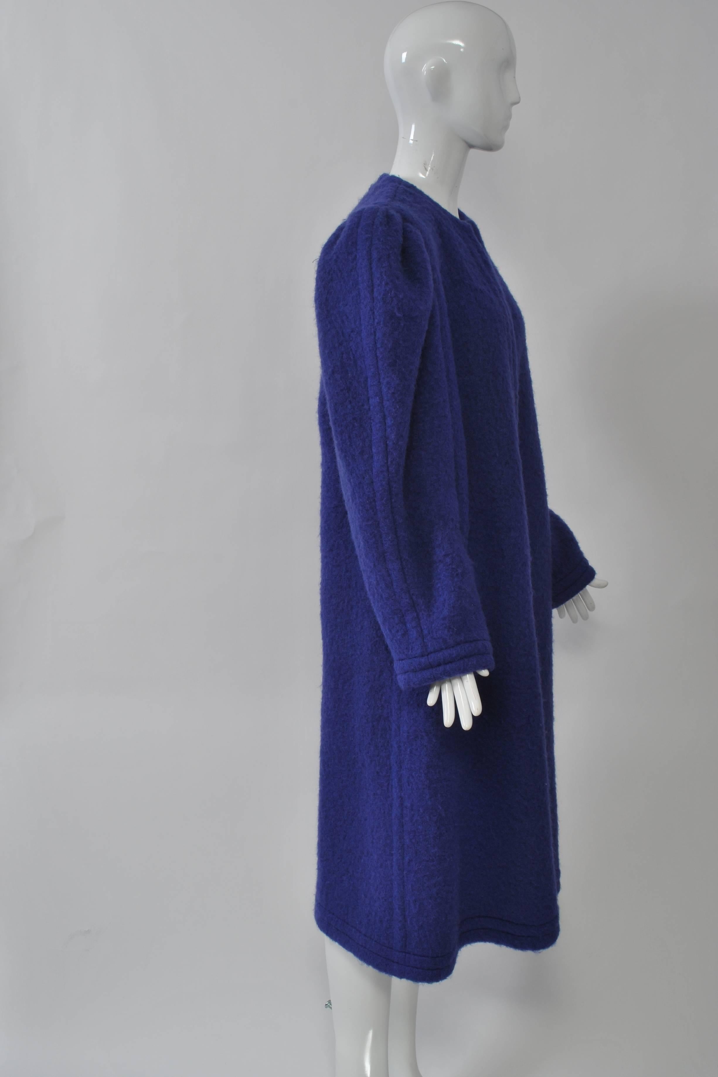 1980s mohair coat in blue violet by Lanvin features shirred puffed sleeves and open front. Double welted borders. Unlined.