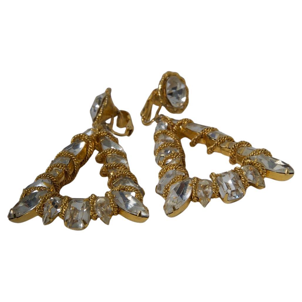 Boucles d
oreilles pendantes en or et cristal Vogue