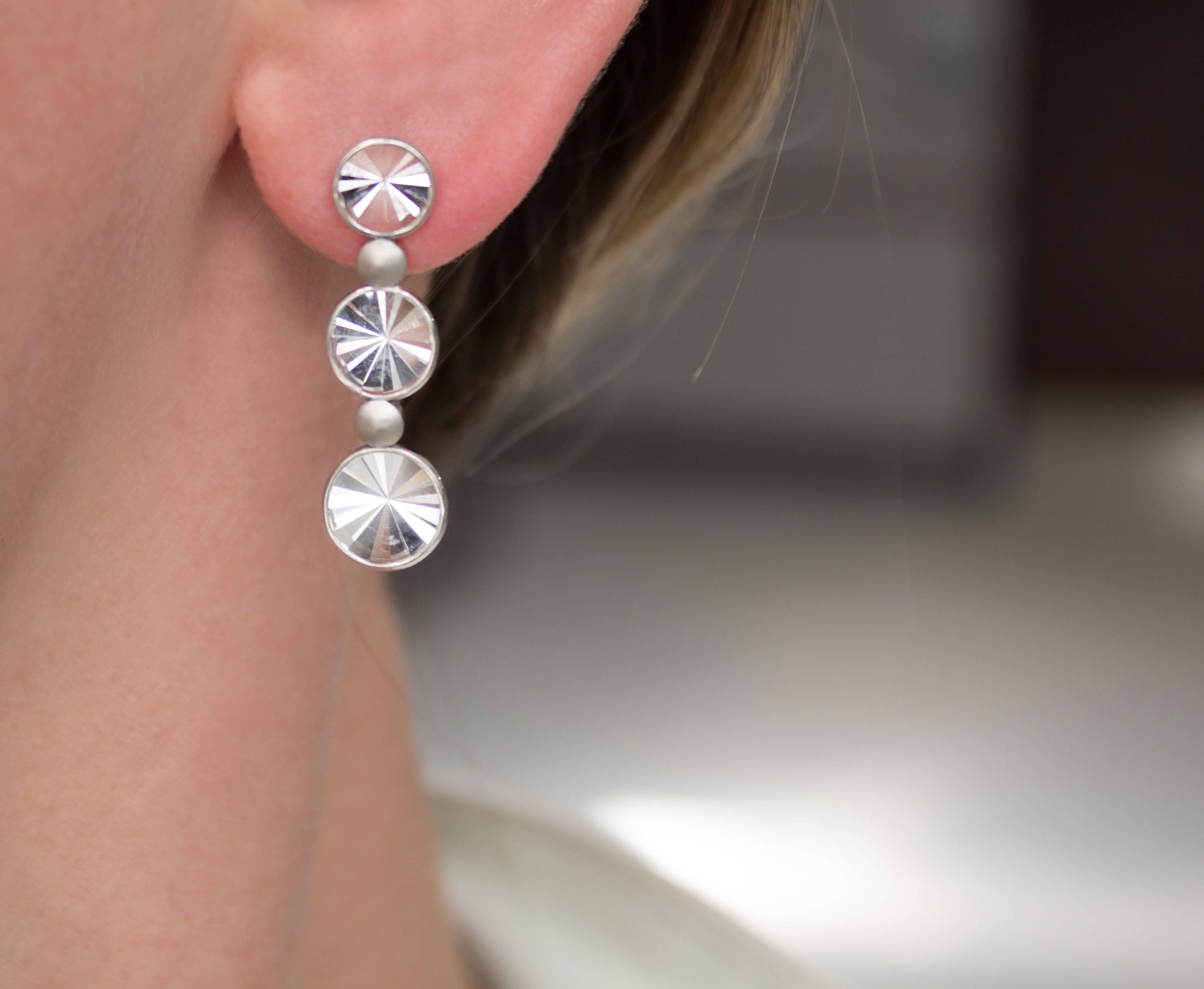 One of a Kind Waterfall Earrings handcrafted in Brazil by jewelry designer Antonio Bernardo featuring six round prism-cut rock crystal quartz elements set in matte finished and polished 18k white gold. Stamped 750 / Antonio Bernardo / with AB