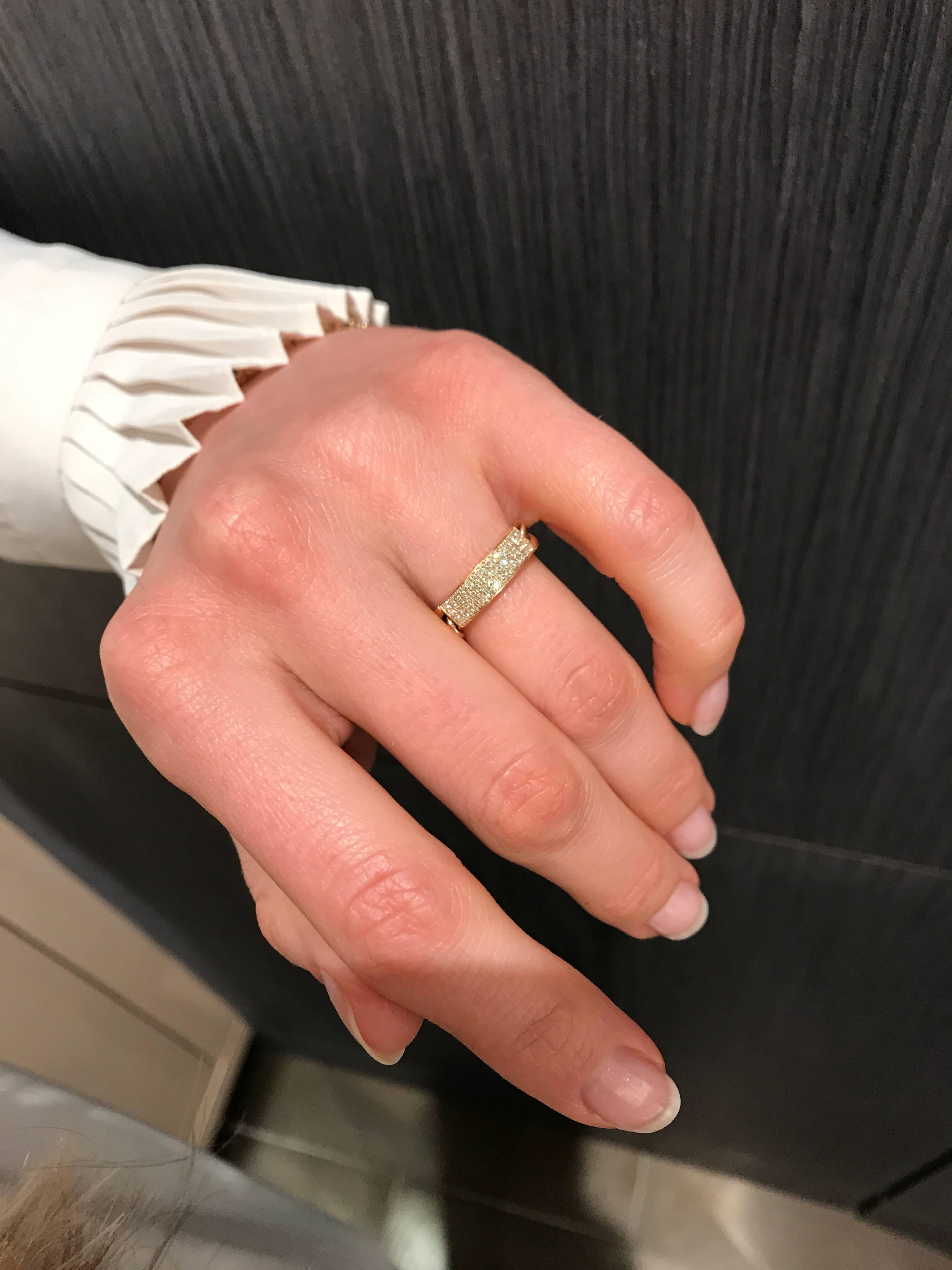 Curved Bar Ring handmade in 14k yellow gold by jewelry designer Fern Freeman featuring a curved bar set with round brilliant-cut white diamonds totaling 0.32 carats and two flexible chain links attached to a stamped and hallmarked curved base. Size