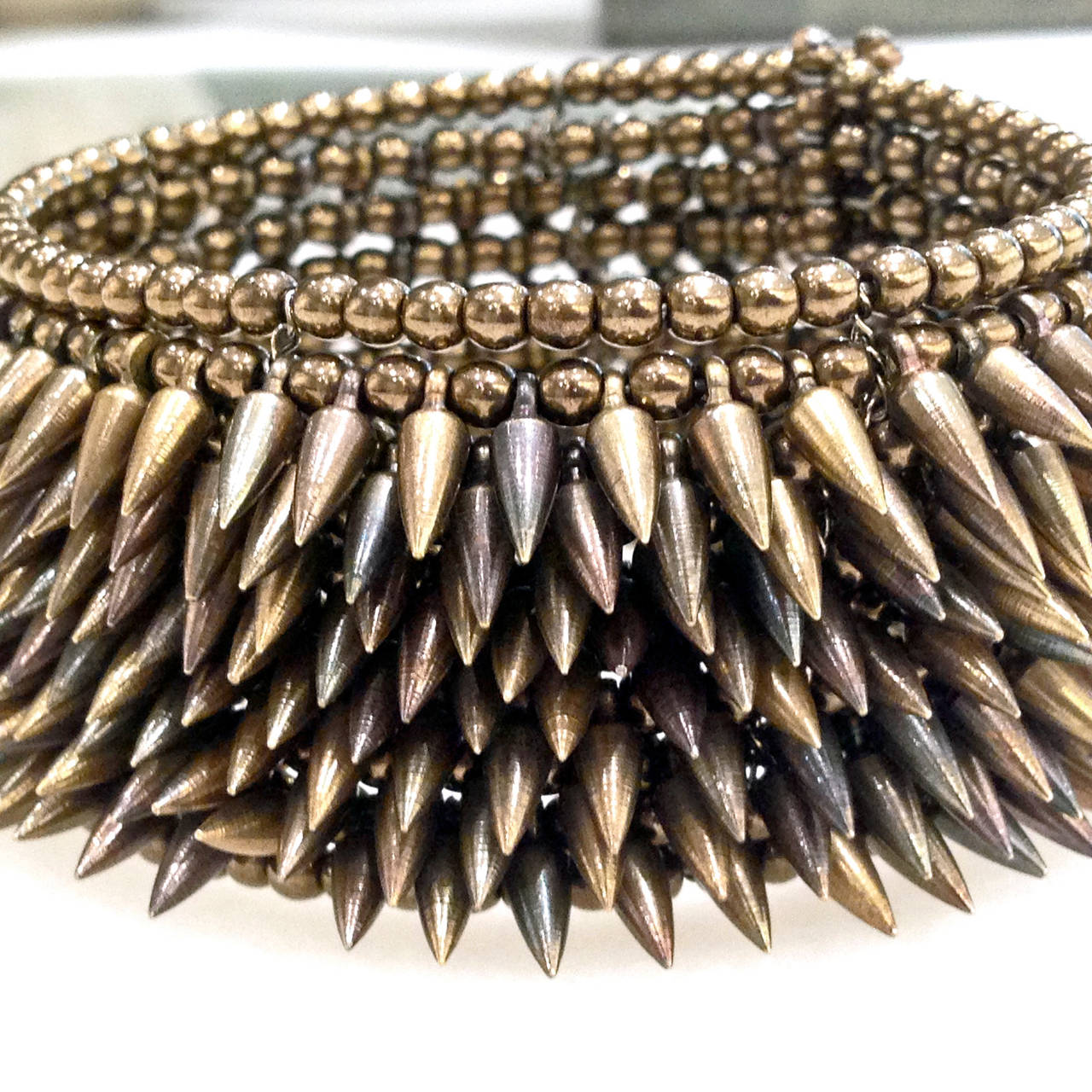 Intricate Eight Row Mixed Tone Bullet Bronze Bead Flexible Cuff In New Condition In Dallas, TX