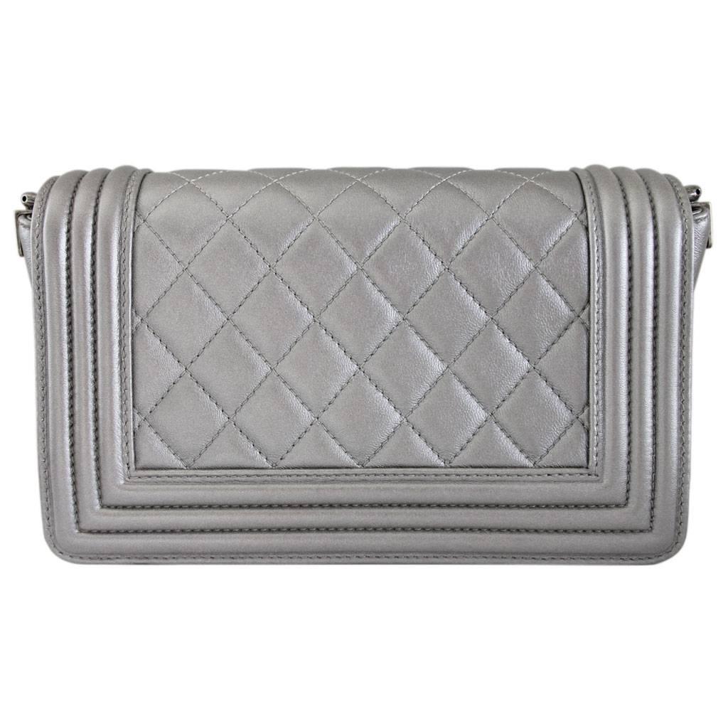 Brand: CHANEL
Style: Boy Bag
Handles: Adjustable, Removable, Silver Calfskin and Stingray Cross Body Strap; 1.75