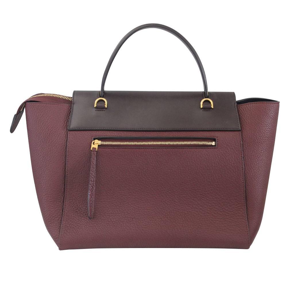 Company: Celine
Handles: Plum Leather Top Handle; Drop: 4