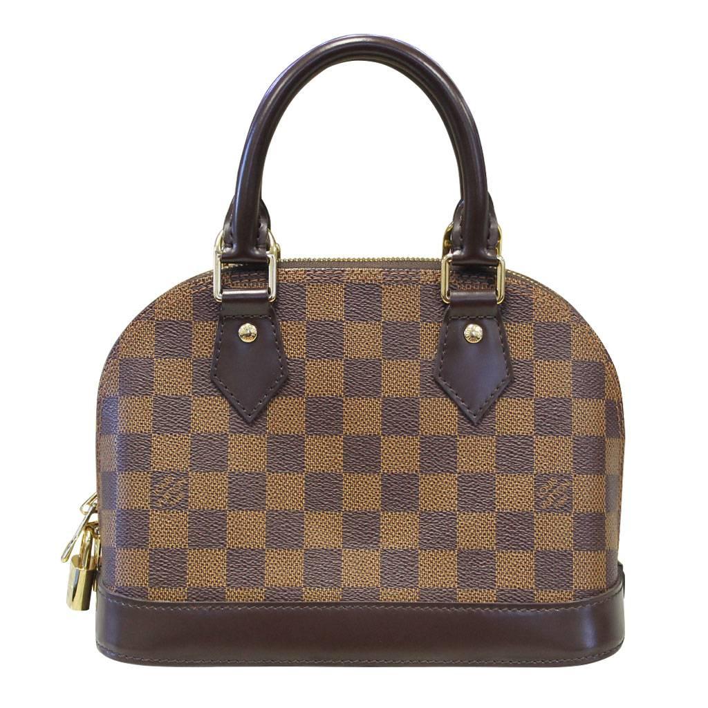 Company: Louis Vuitton
Style: Shoulder Bag
Handles: Small Brown Handles; Drop:3