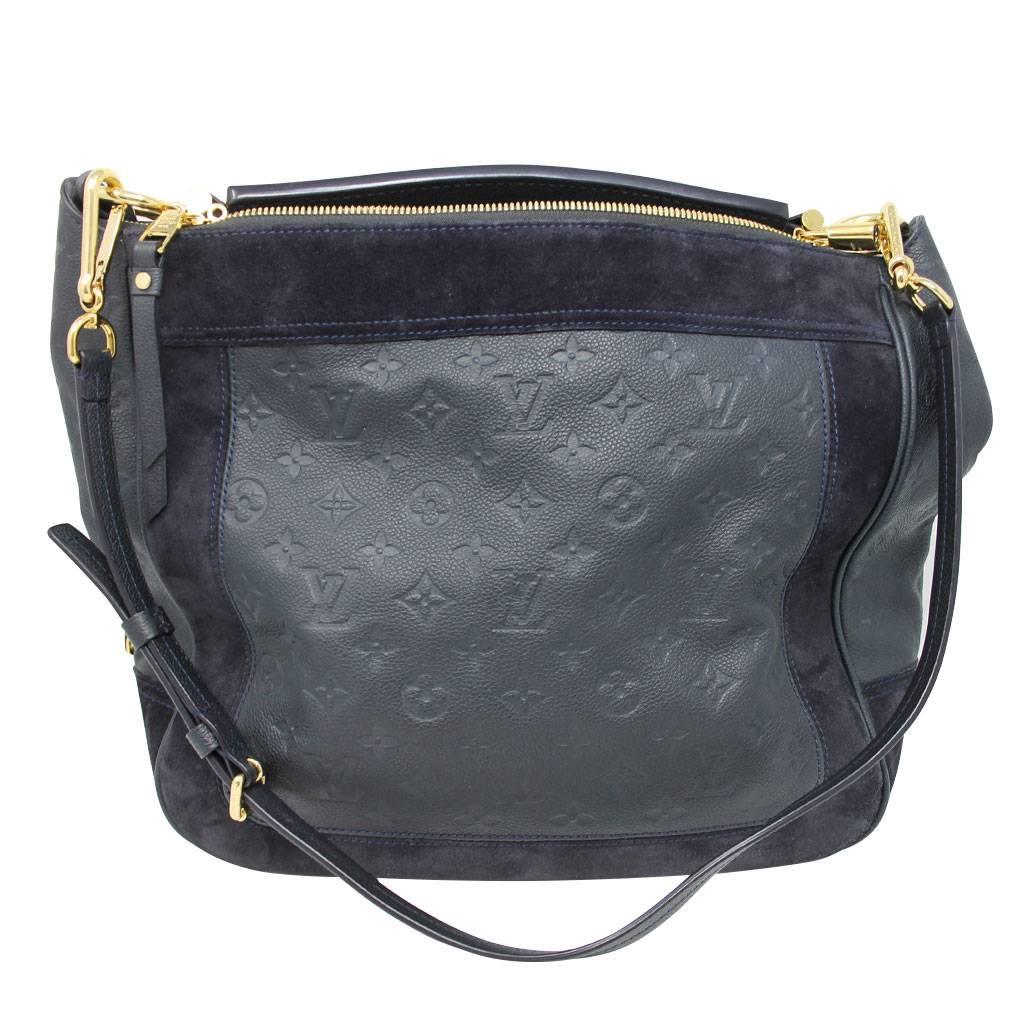 Brand: Louis Vuitton
Handles: Navy Blue Suede and Leather Short Handle; Drop: 10