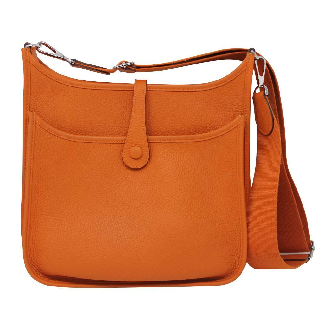 Brand: Hermes
Handles: Orange Canvas Adjustable Shoulder Strap
Drop: 36