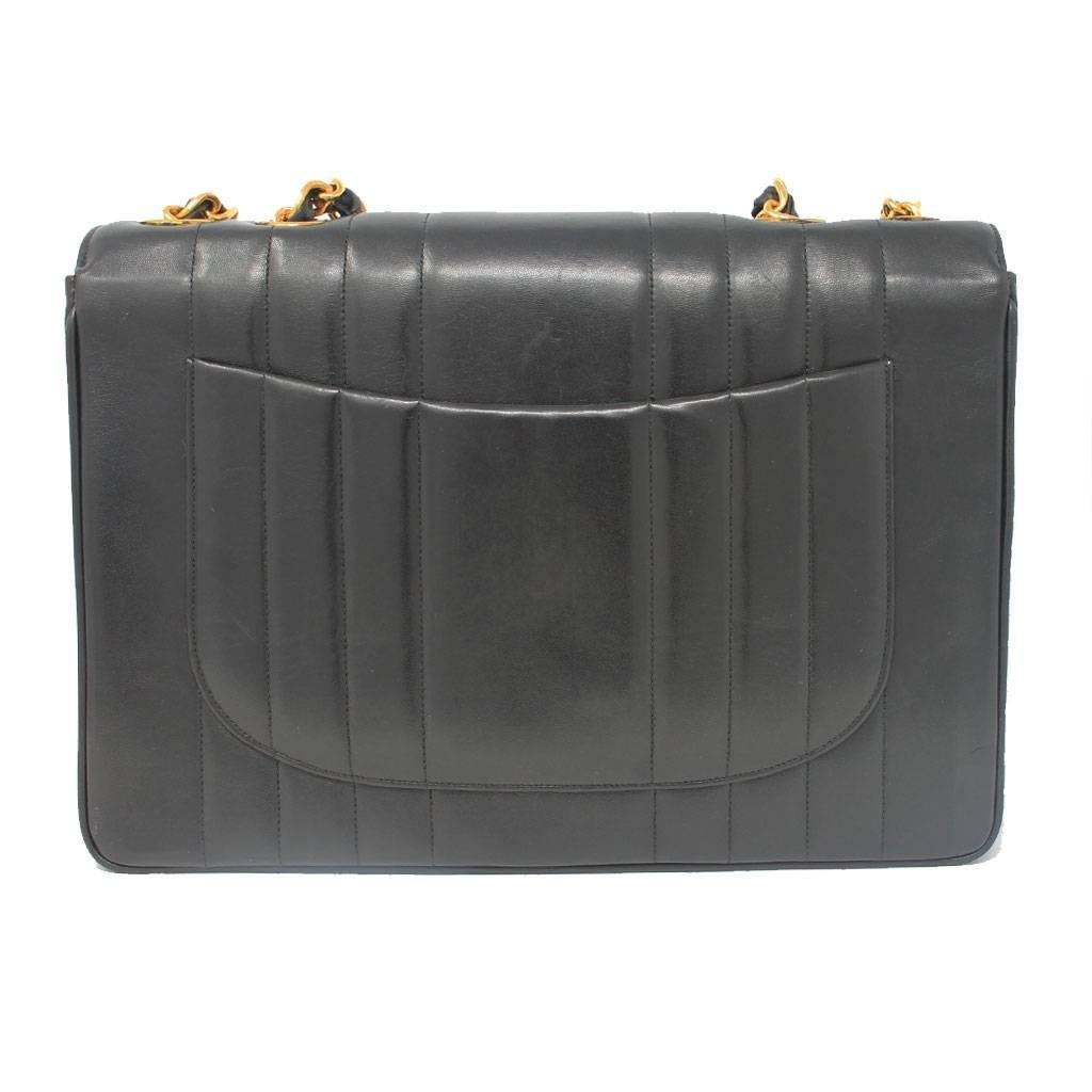 Chanel Black Quilted Lambskin Vertical Maxi Flap GHW Vintage Handbag at