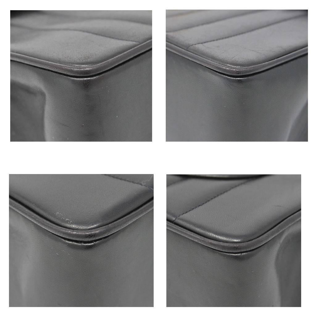 Chanel Black Quilted Lambskin Vertical Maxi Flap GHW Vintage Handbag at