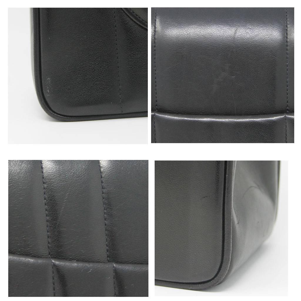 Chanel Black Quilted Lambskin Vertical Maxi Flap GHW Vintage Handbag at
