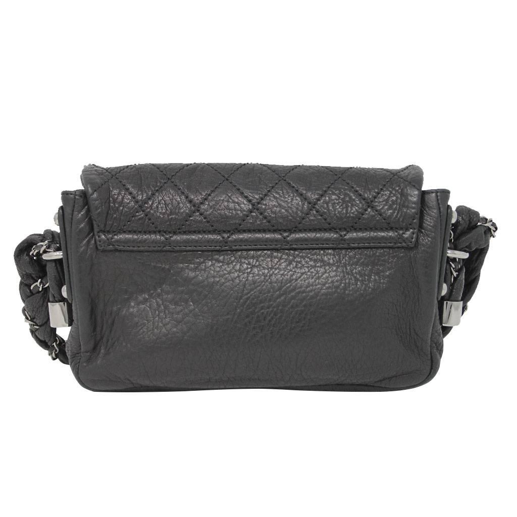 Brand: Chanel
Handles: Black Distressed Leather Braided with Palladium Chain Hardware
Drop: 7