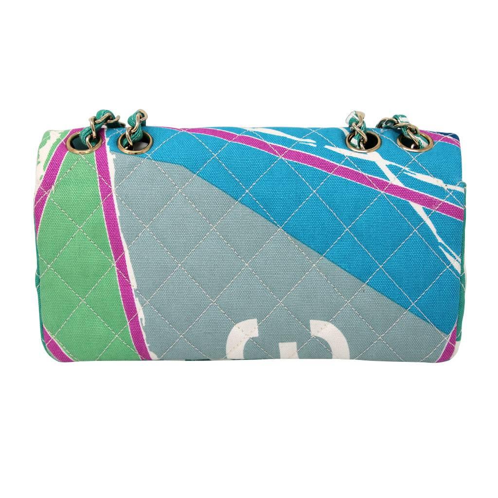 Brand: Chanel
Handles: Multicolor Pastel Colored Canvas Braided in Silver Chain
Doubled Drop: 9