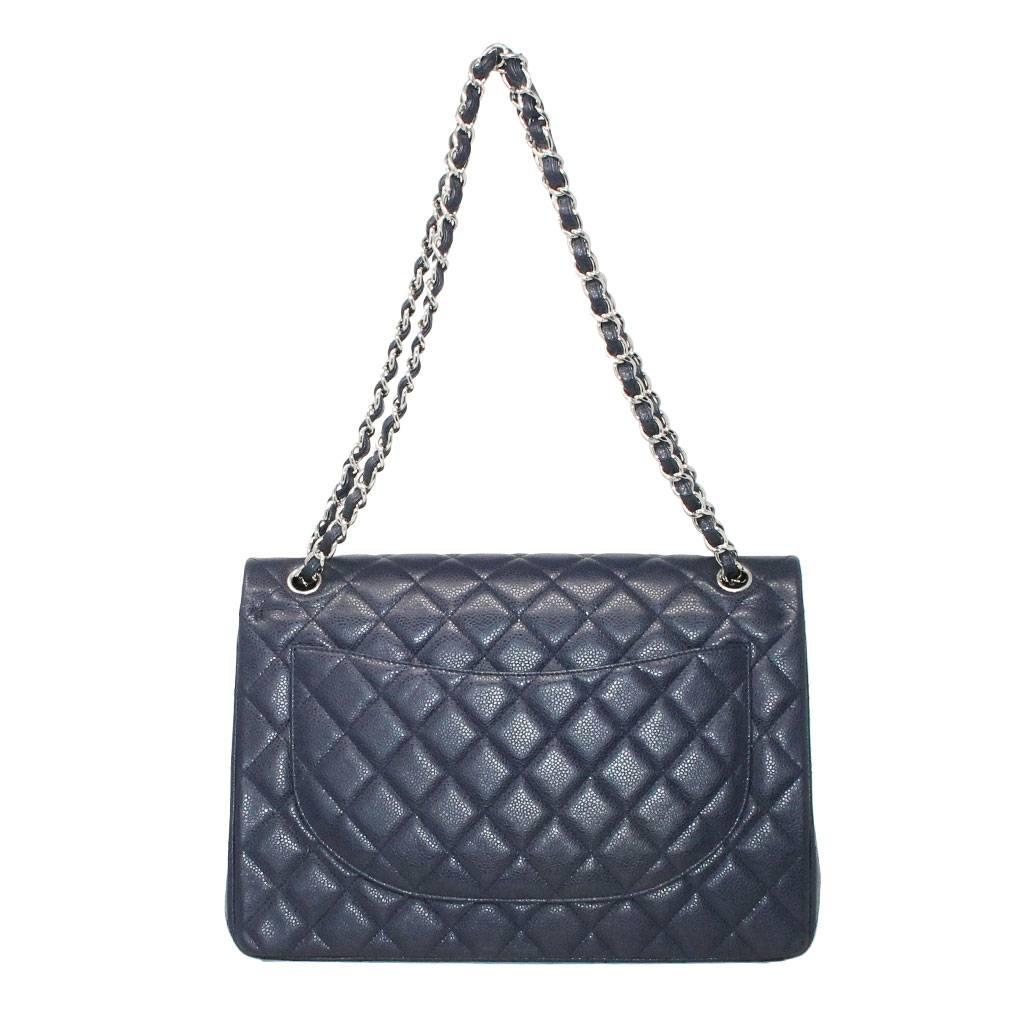 Brand: Chanel
Handles: Braided Palladium Chain with Navy Blue Caviar Leather
Drop: 19