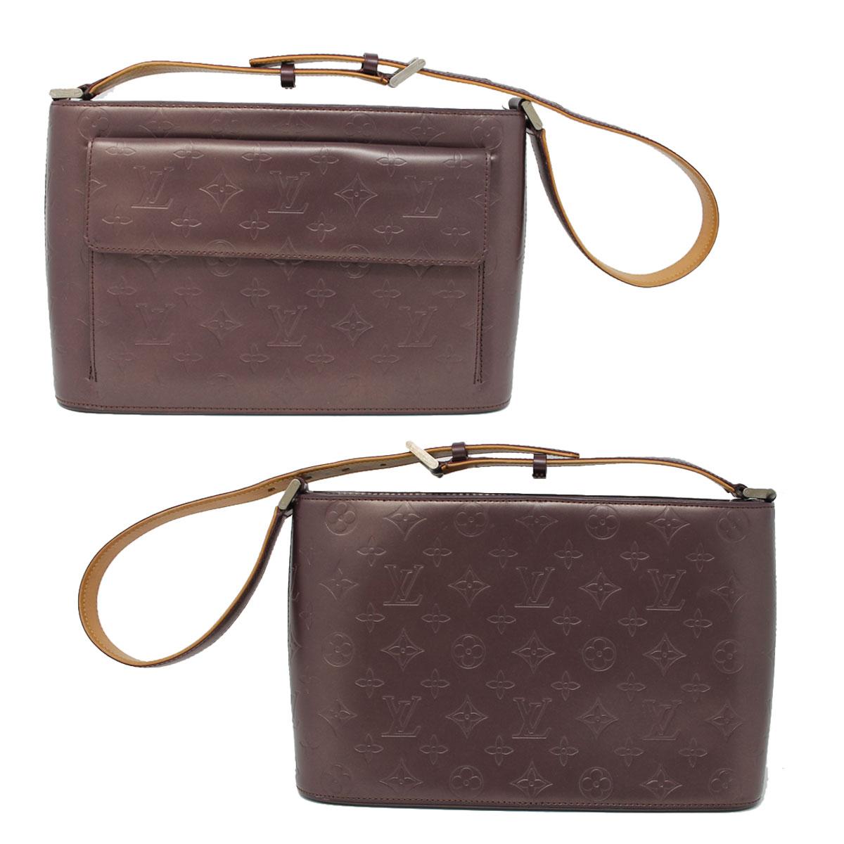 Brand: Louis Vuitton
Style: Handbag
Handles: Purple Leather Shoulder Strap, adjustable from 10″ – 12″
Measurements: 12″ x 3.5″ x 7.5″
Materials: Monogram Mat Embossed leather with semi-metallic finish
Hardware & Lining: Cowhide Leather Trim,