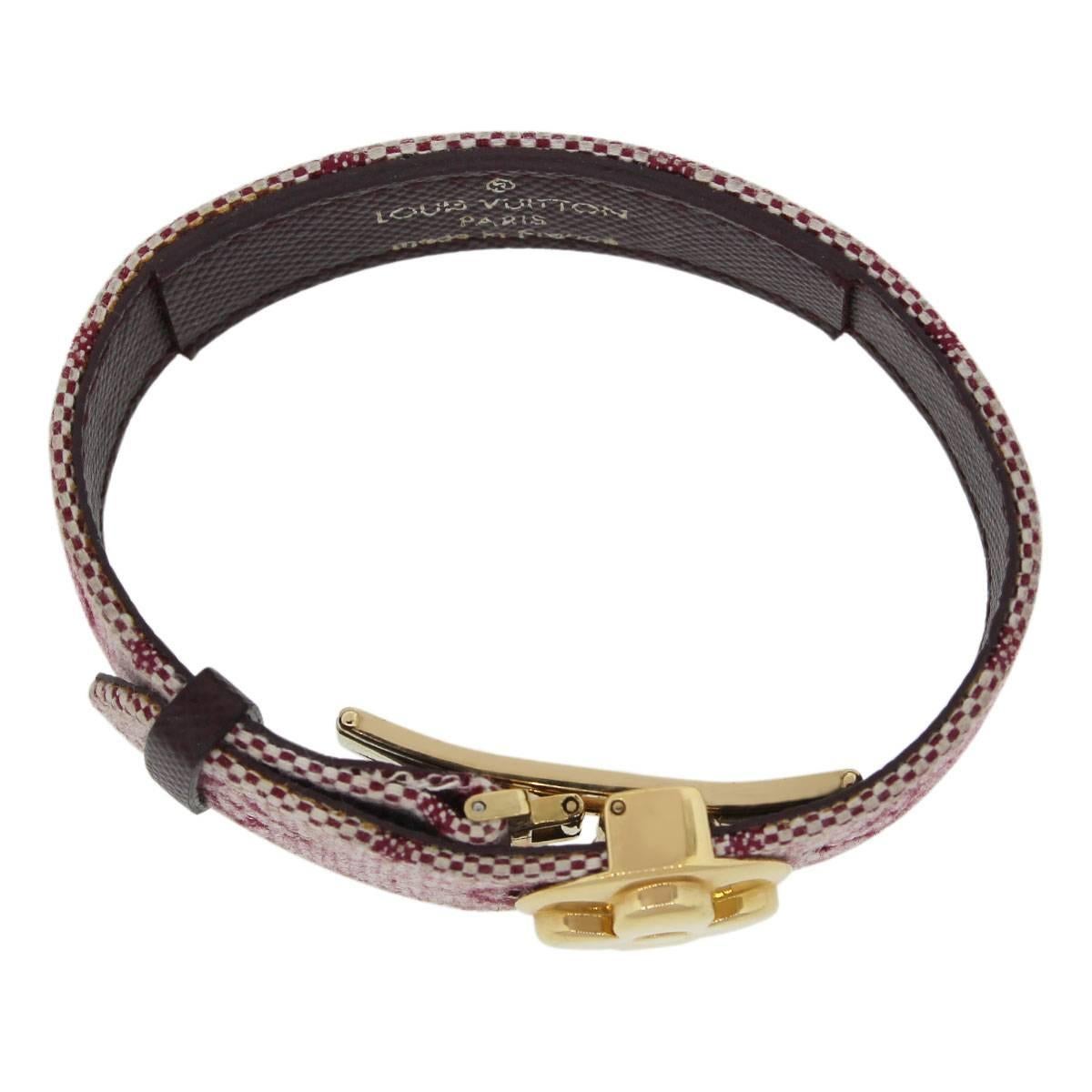 Company: Louis Vuitton
Style: Adjustable Bangle Bracelet
Measurements: Adjustable up to a 6.5