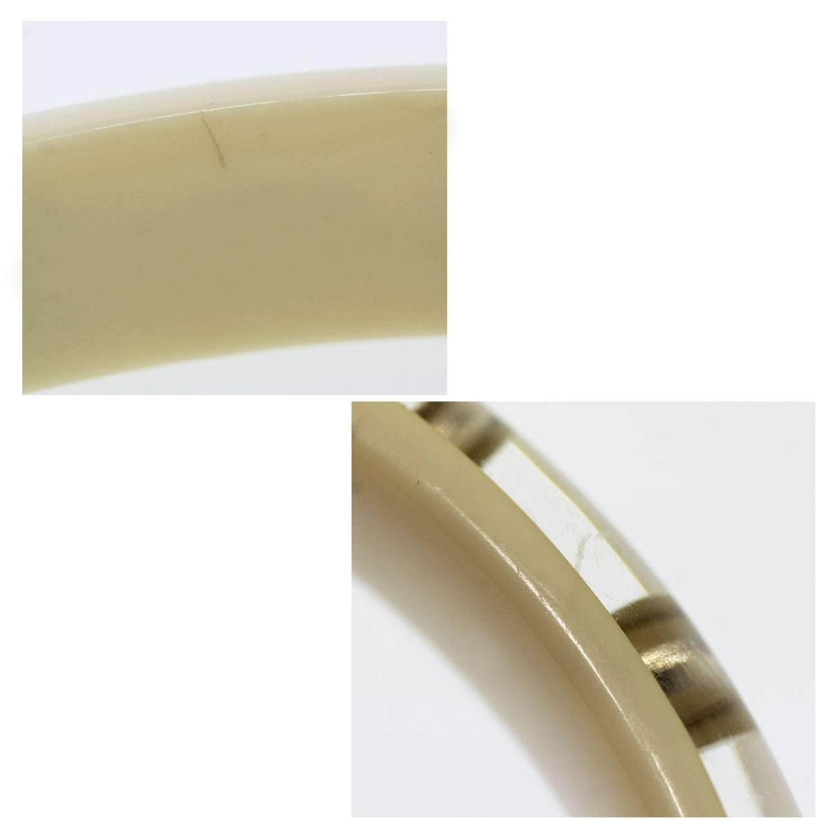 Women's Authentic Chanel Ivory Gold Tone Logo 09 P Bangle Bracelet