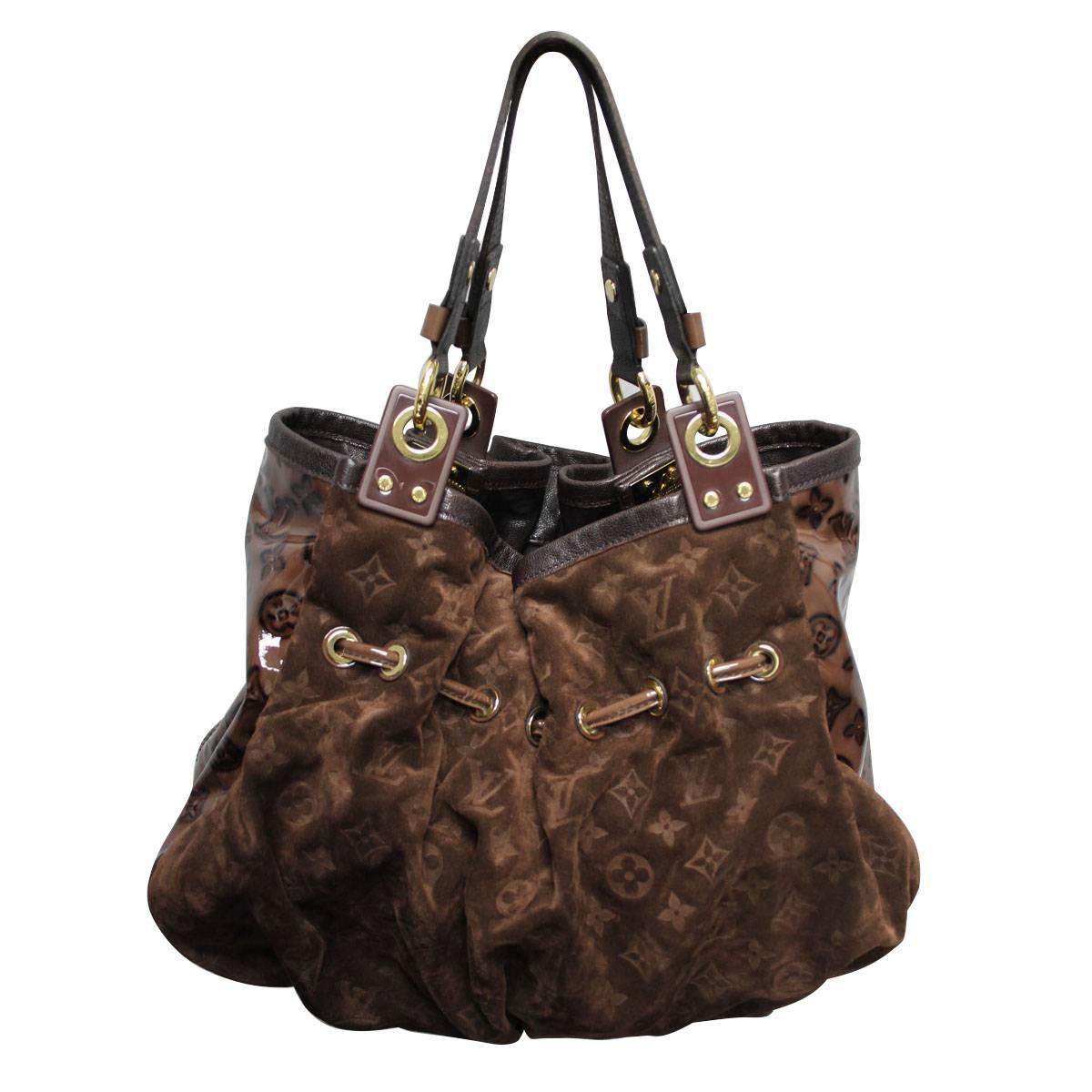 Company: Louis Vuitton
Style: Large Shoulder Bag
Materials: Espresso Suede, Patent Leather
Handles: Brown Leather Handles, Drop: 6