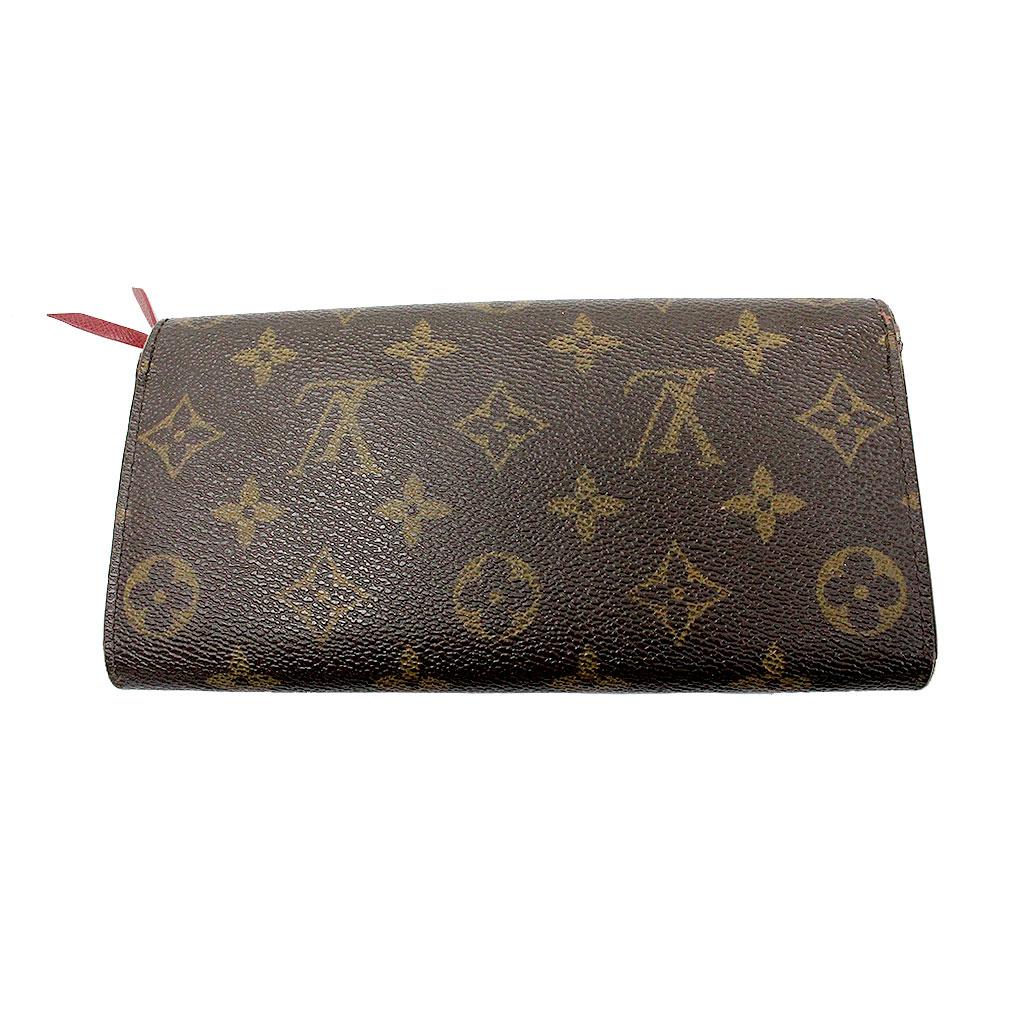 Brand: Louis Vuitton
Style: Envelope Style Wallet
Materials: Brown Monogram Canvas, Deep Red/Rouge Canvas
Measurements: 7.7
