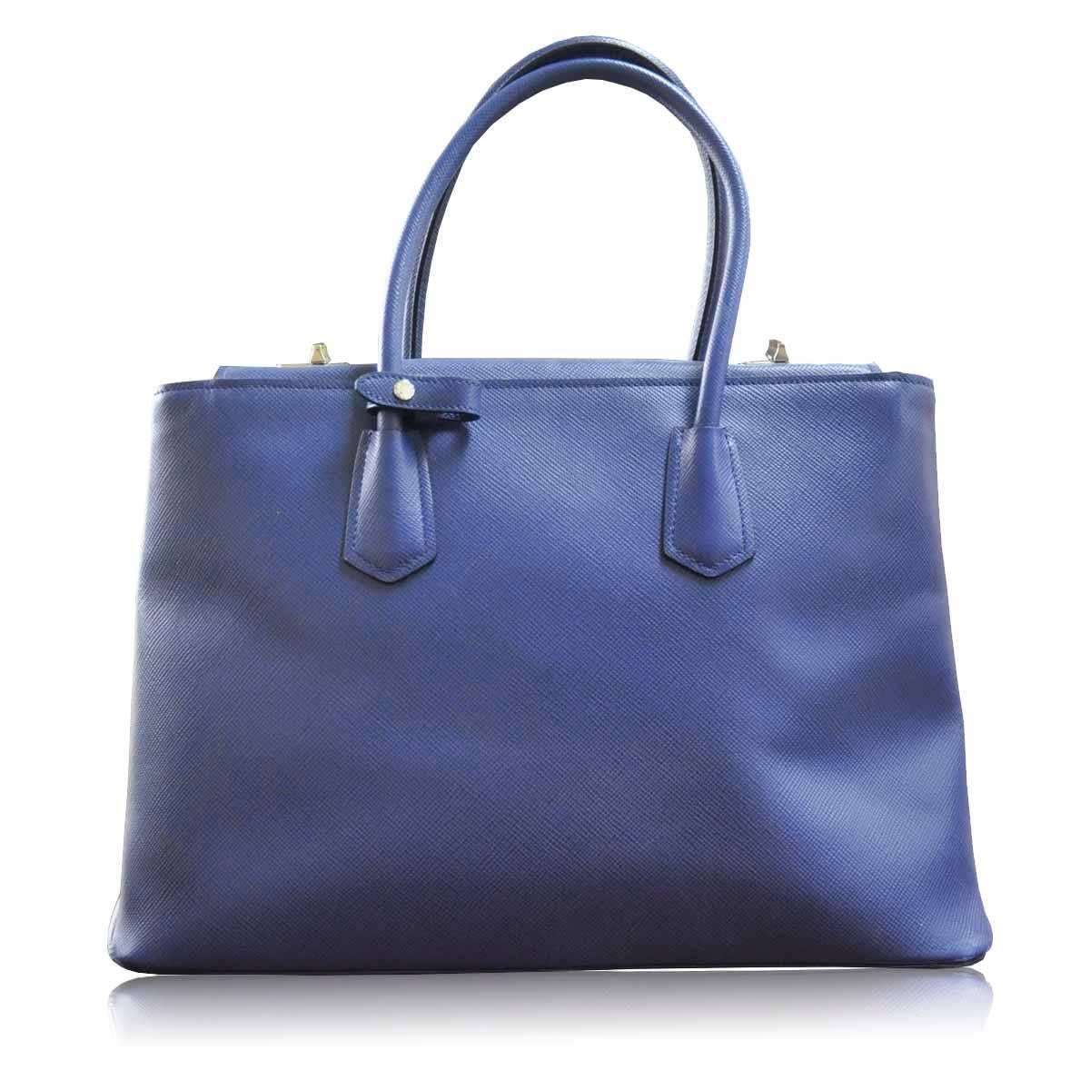 Company - PRADA
Model - Tote Twin Bag
Material - Blue Leather, Bluette
Measurements - 15″ x 10.25″ x 7″
Condition - Outside – Excellent condition.  Some small white marks on the bottom.  Very minor. 9/10
Inside – Excellent condition, no rips,