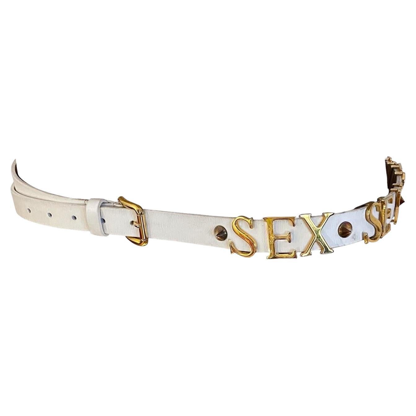Dolce & Gabbana white leather belt with triple spell-out “Sex” Golden Metal Logo, gold studs and gold buckle from the Spring/Summer 2003 collection. 
Minor signs of usage.

Comes with original dust bag

Total length: 109.5 cm/ 43.1 inch
