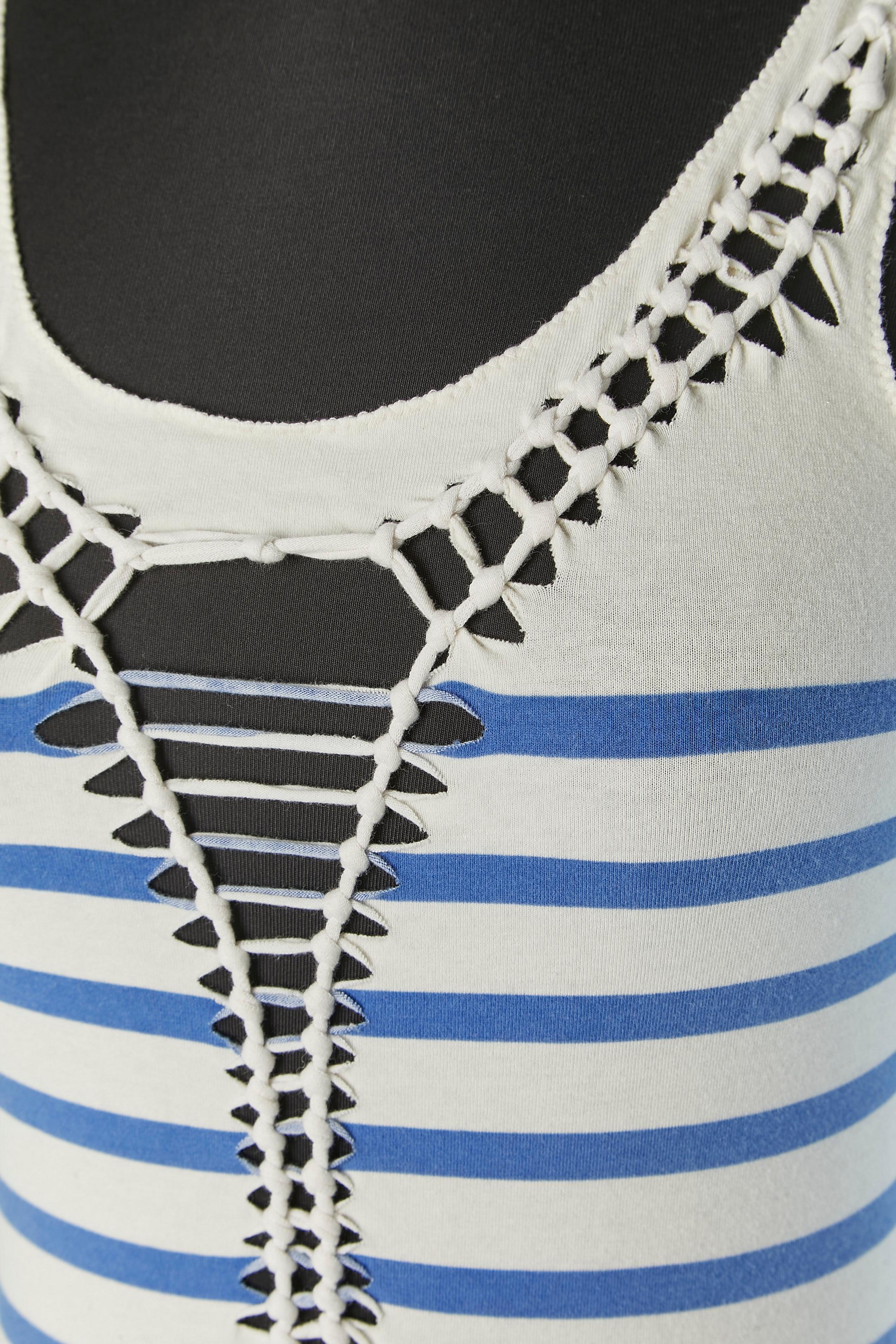 Canotta in cotone a righe. Composizione del tessuto: 90% cotone, 10% elastan. 
TAGLIA S, ma si adatta alla XS 