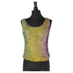 Top senza maniche con perline su maglia in lurex argentato Circa anni '70