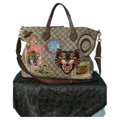 Supreme GG coated canevas top handle bag with patches GUCCI