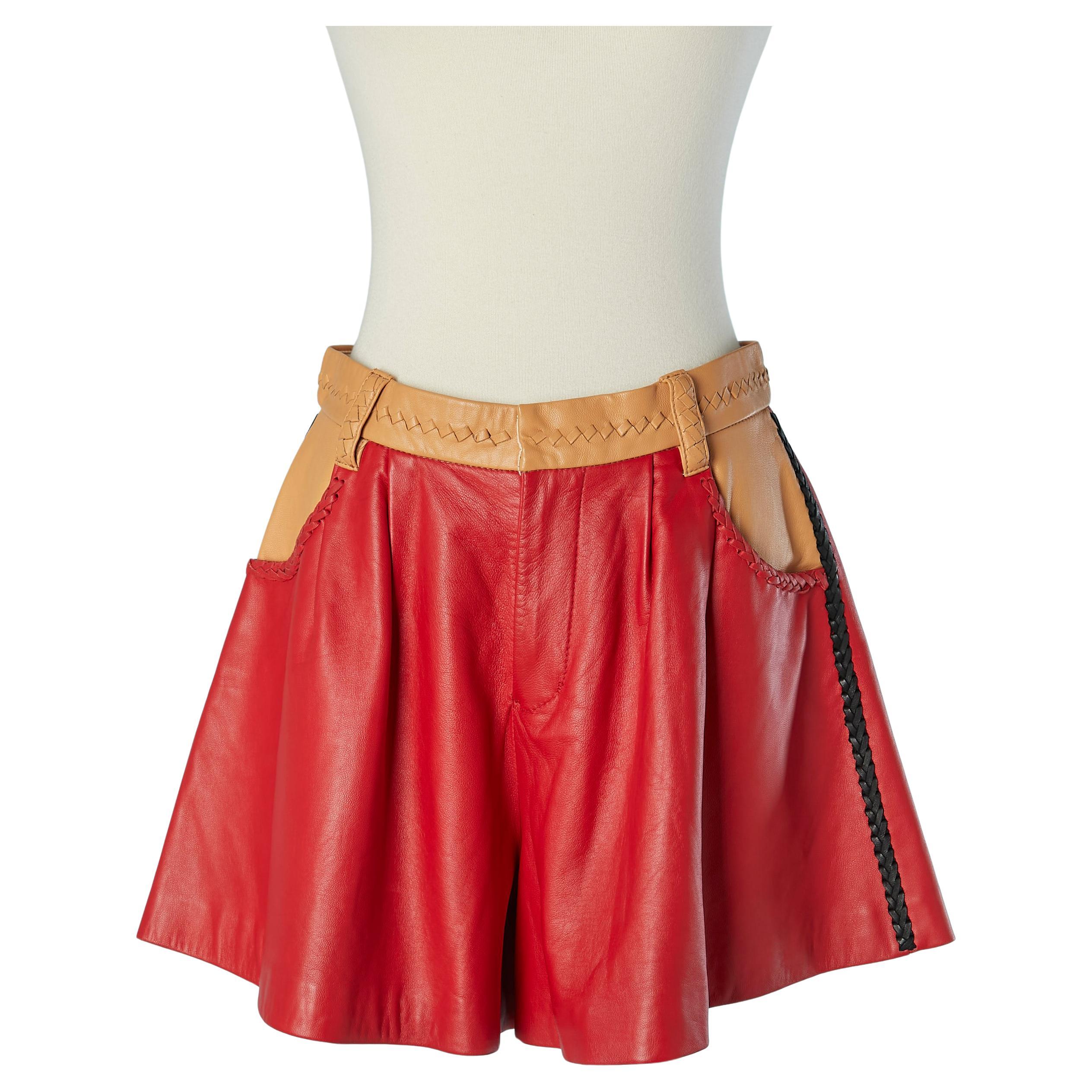 Pantaloncini in pelle rossa e beige con treccia sul bordo Tsumori Chisato