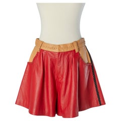 Red and beige leather short with braid on the edge TSUMORI CHISATO