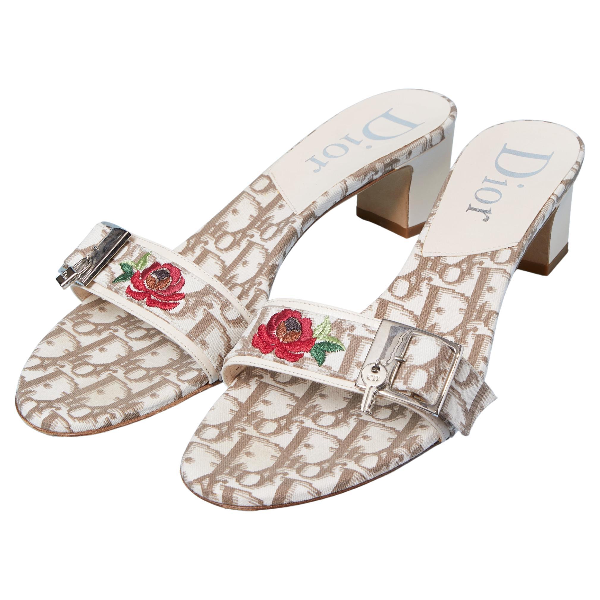 Christian Dior mules in monogram canvas with embroidered rose For Sale