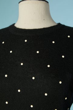 Black knit cocktail dress with pearl appliqué CHANEL