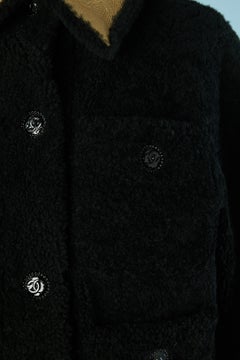 Black shearling jacket with gold collar and cuff CHANEL