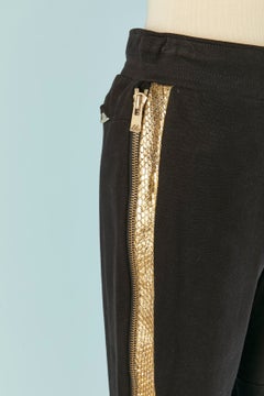 Black cotton jogging pant with gold leather details ALEXANDRE VAUTHIER COUTURE