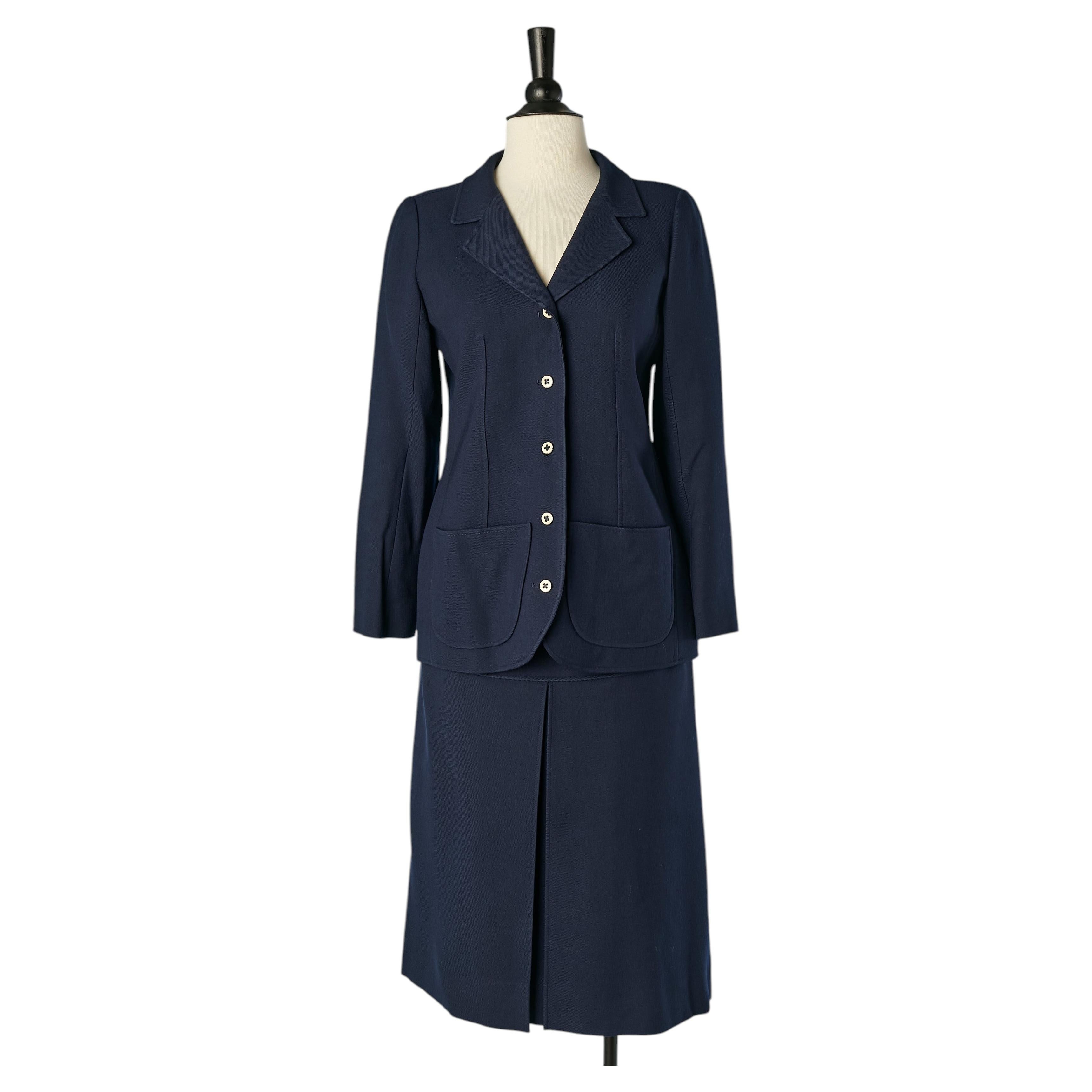 Ensemble jupe-tailleur en laine bleu marine COURRÈGES en vente