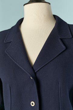 Ensemble jupe-tailleur en laine bleu marine COURRÈGES