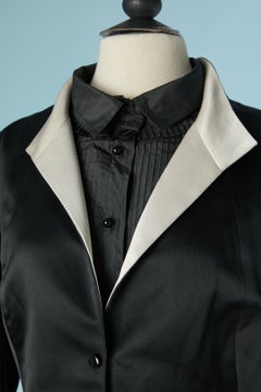 Black satin skirt-suit with white details and shirt OSCAR DE LA RENTA