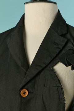 Black jacket with ruffles COMME DES GARCONS