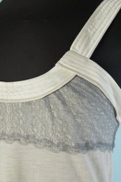 Grey jersey tank top with lace on the top edge NINA RICCI