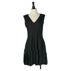 Black sleeveless cocktail dress with ruffles ALAIA