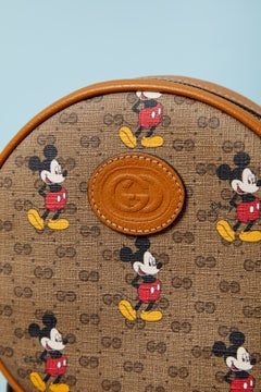 Mini round back-pack leather bag with Mickey print GUCCI